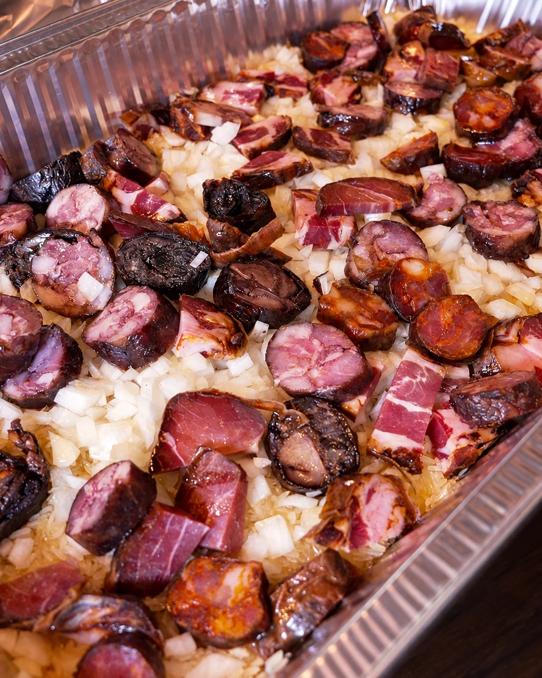 A generous tray of Portuguese appetizers and charcuterie